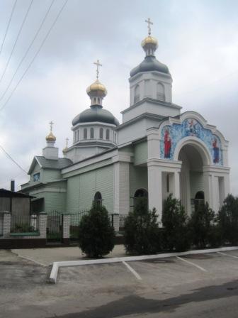 Он за центральной площадью будет слева по ходу движения.